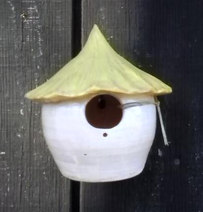Small bird hut on wall